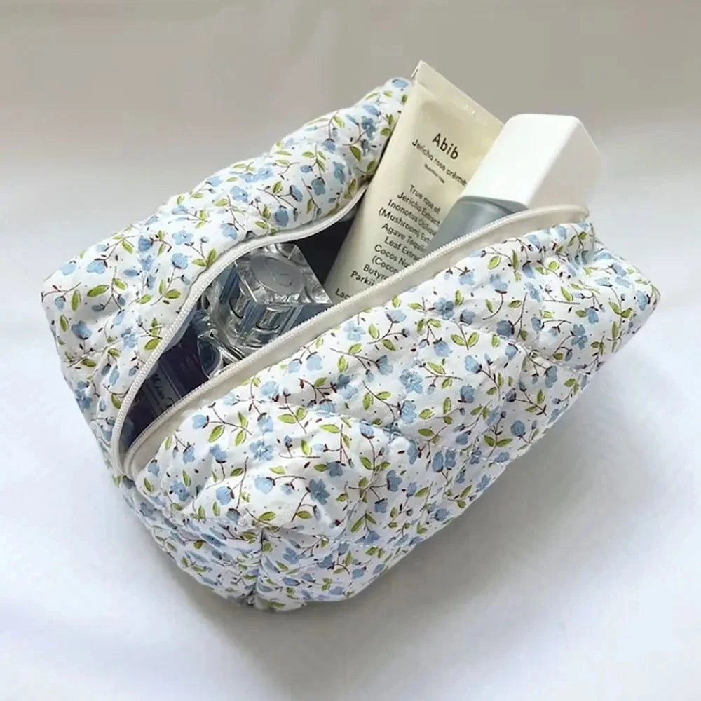 Blue floral quilted makeup bag